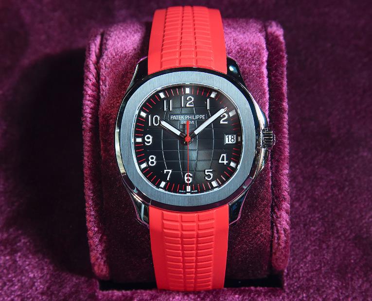 The eye-catching fake watches have red rubber straps.