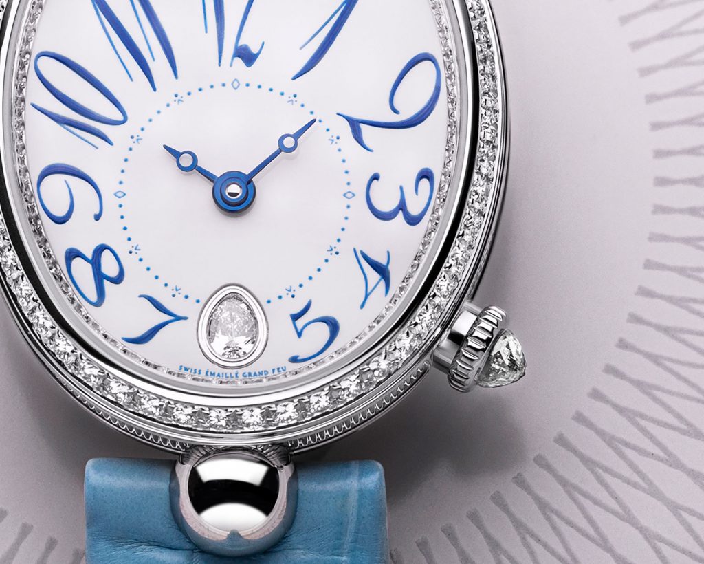 The white dials copy watches are decorated with diamonds.